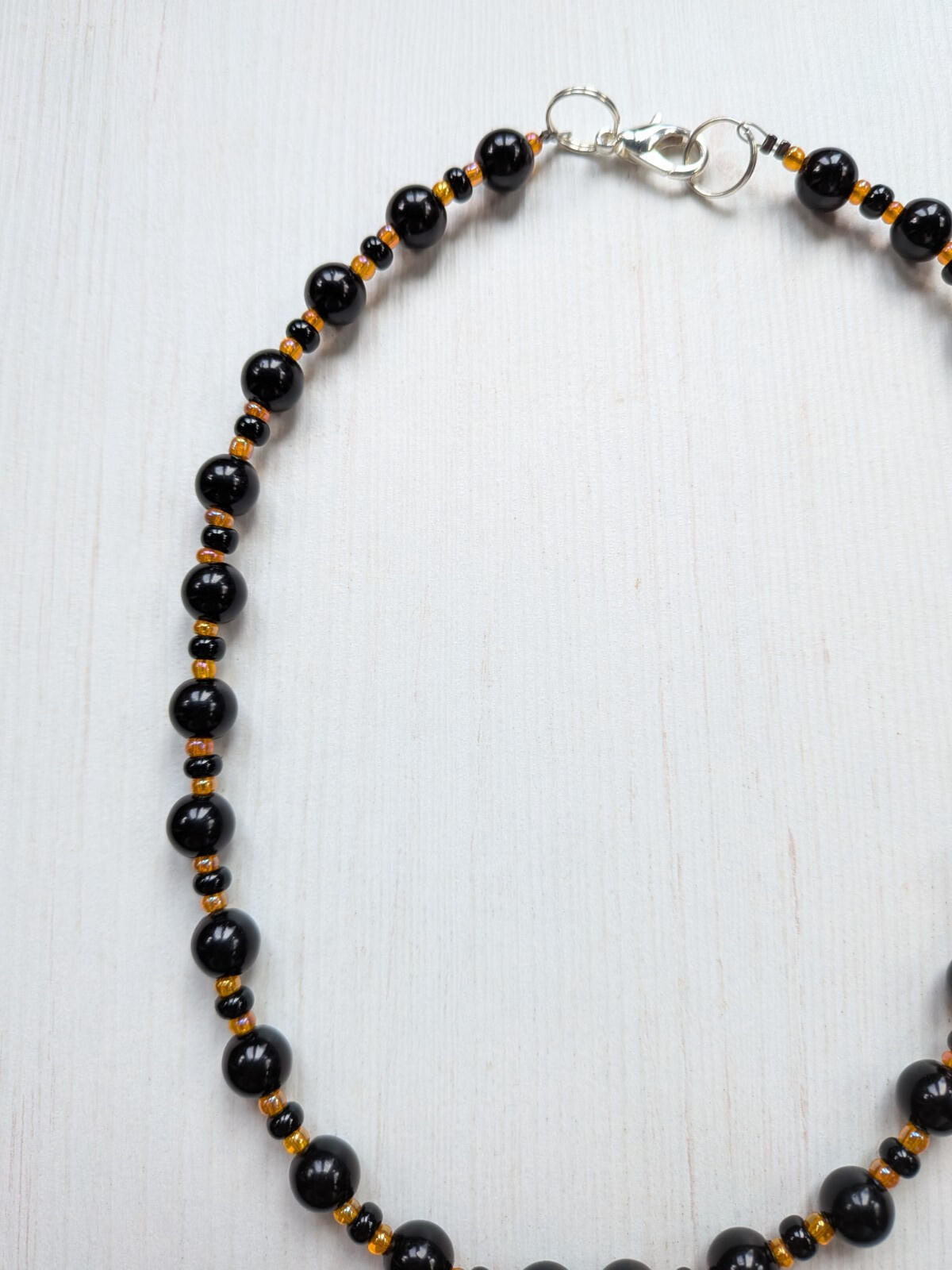 Black and Orange Plastic Beaded Choker Necklace with Metal Cat Pendant