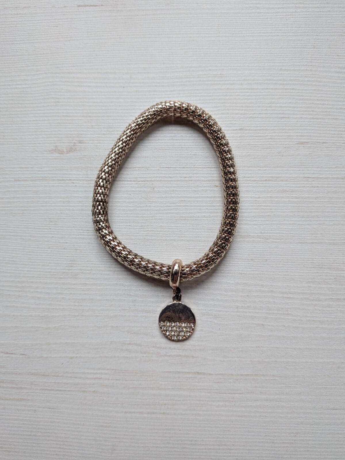 Rose Gold Toned Metal Mesh Bracelet with Circular Charm