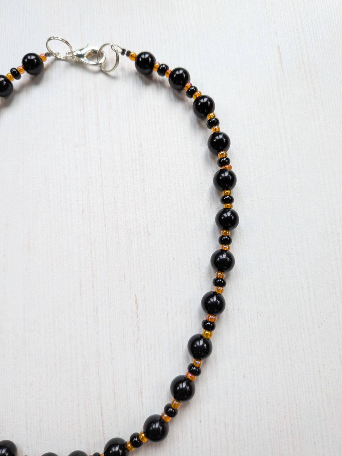 Black and Orange Plastic Beaded Choker Necklace with Metal Cat Pendant