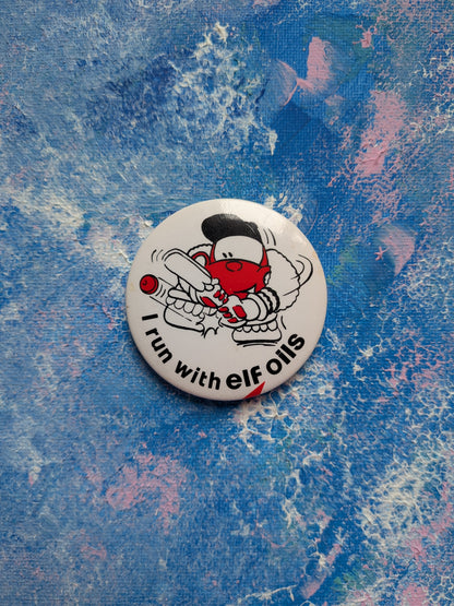 Vintage Cricket Cartoon Badge "I Run With Elf Oils"