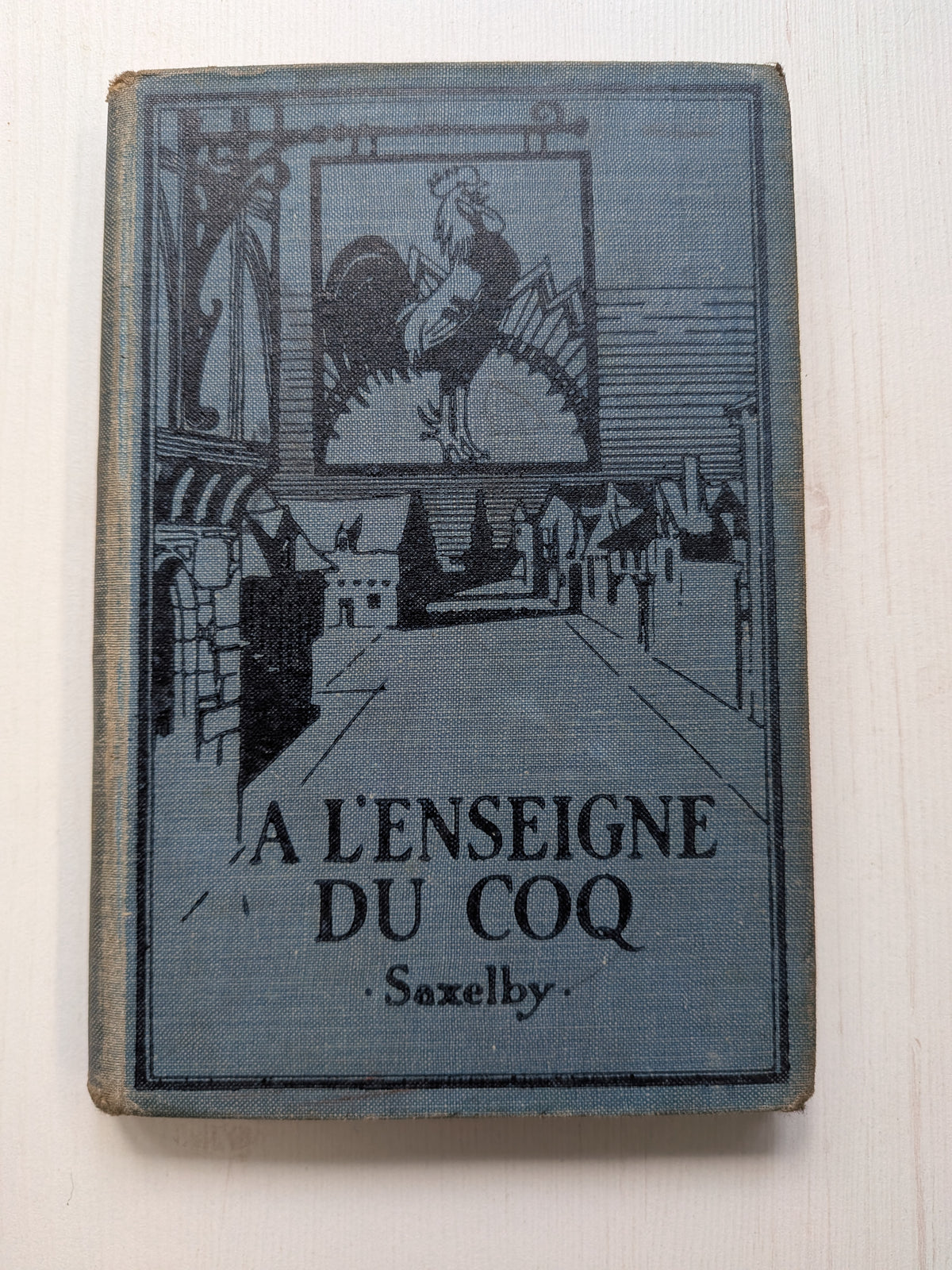 A L'enseigne Du Coq by E. Saxelby - Ginn and Company Ltd