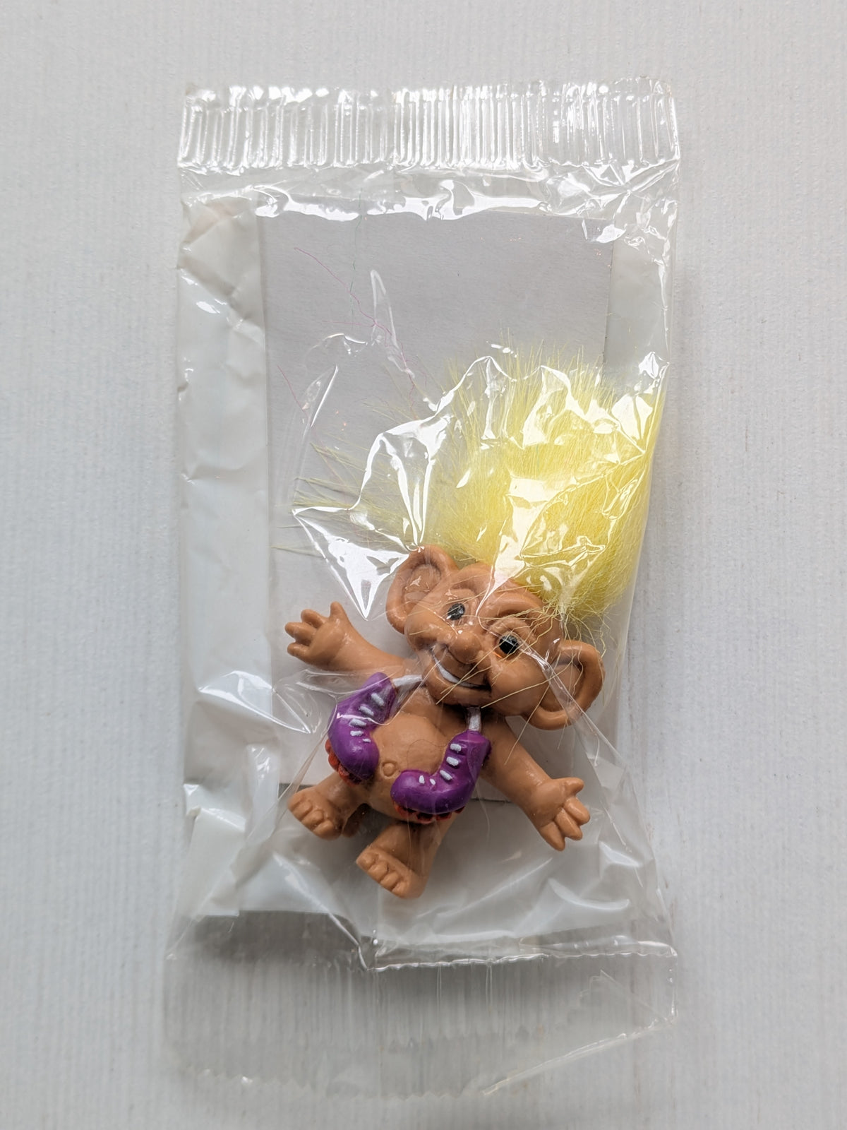 Vintage Troll with Yellow Hair and Rollerskates Weetos Cereal Toy, 1990s