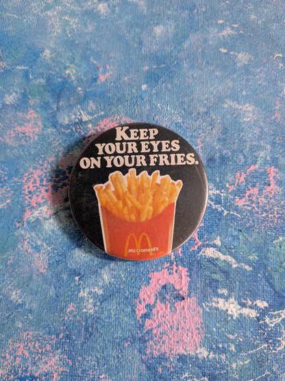 Vintage McDonalds "Keep Your Eyes On Your Fries" Slogan Badge - 1980s